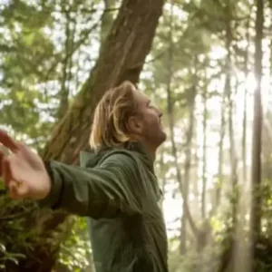 young-man-embracing-rainforest-standing-in-sunbeams-illuminating-the-trees.jpg_s=1024x1024&w=is&k=20&c=WqV8nv_8bBsofgXlCH9J9j2s7XNmebNHLmVZ27cVzKk=1